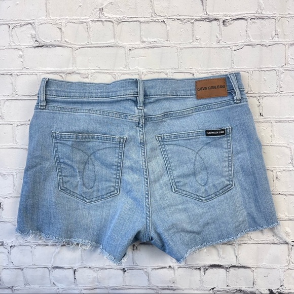 Calvin Klein Jeans Woman’s Cut Off Light Blue Mid rise Jean shorts distressed 30 - Picture 2 of 12